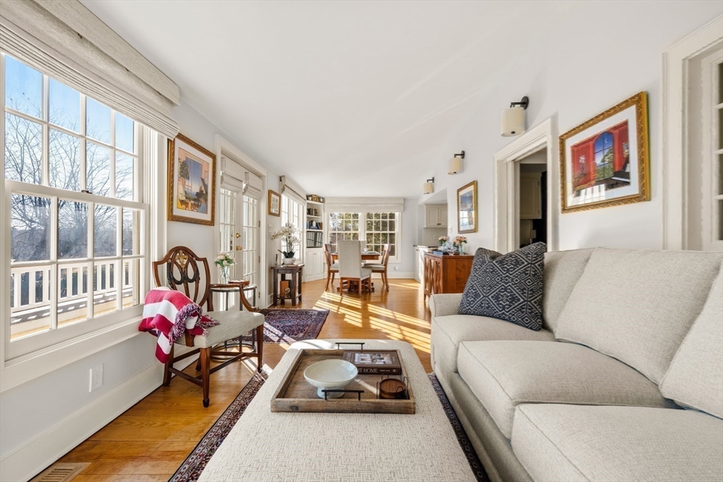 151 Oakland Street Wellesley, MA 02481 - Photo 6 of 42 a living room with furniture garden view and a large window