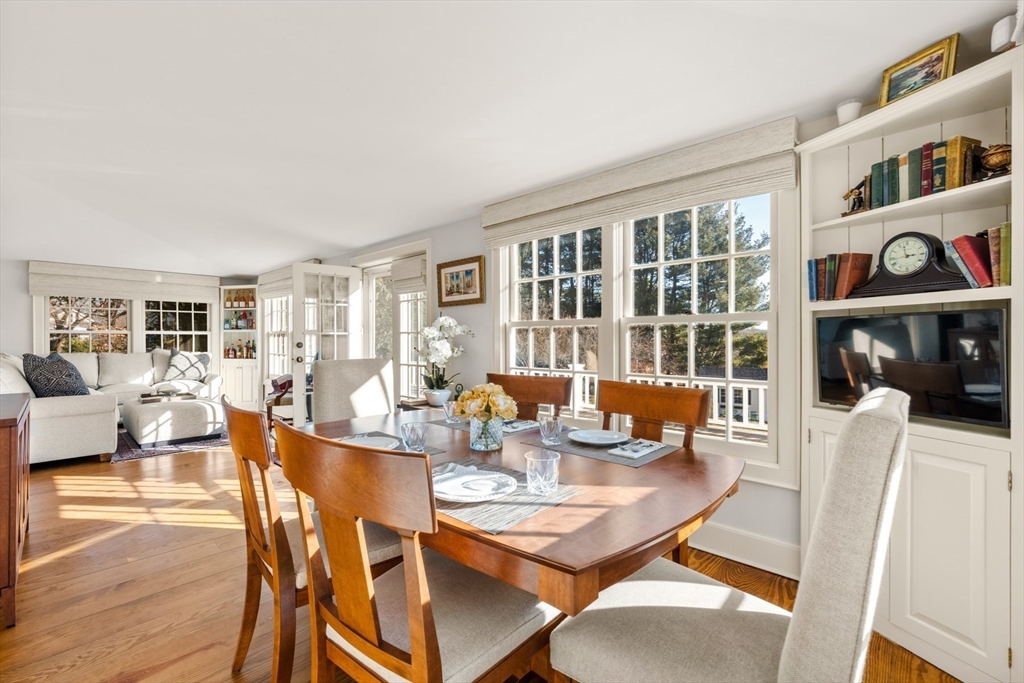 151 Oakland Street Wellesley, MA 02481 - Photo 8 of 42 a view of a dining room with furniture window and outside view