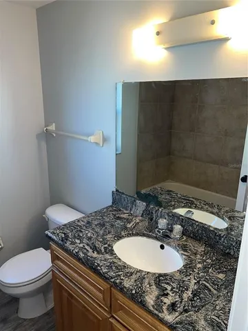 a bathroom with a sink and a toilet