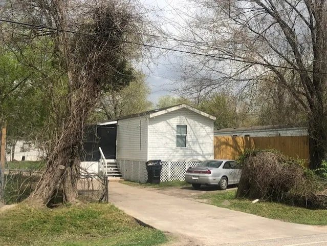 a view of a house with a patio