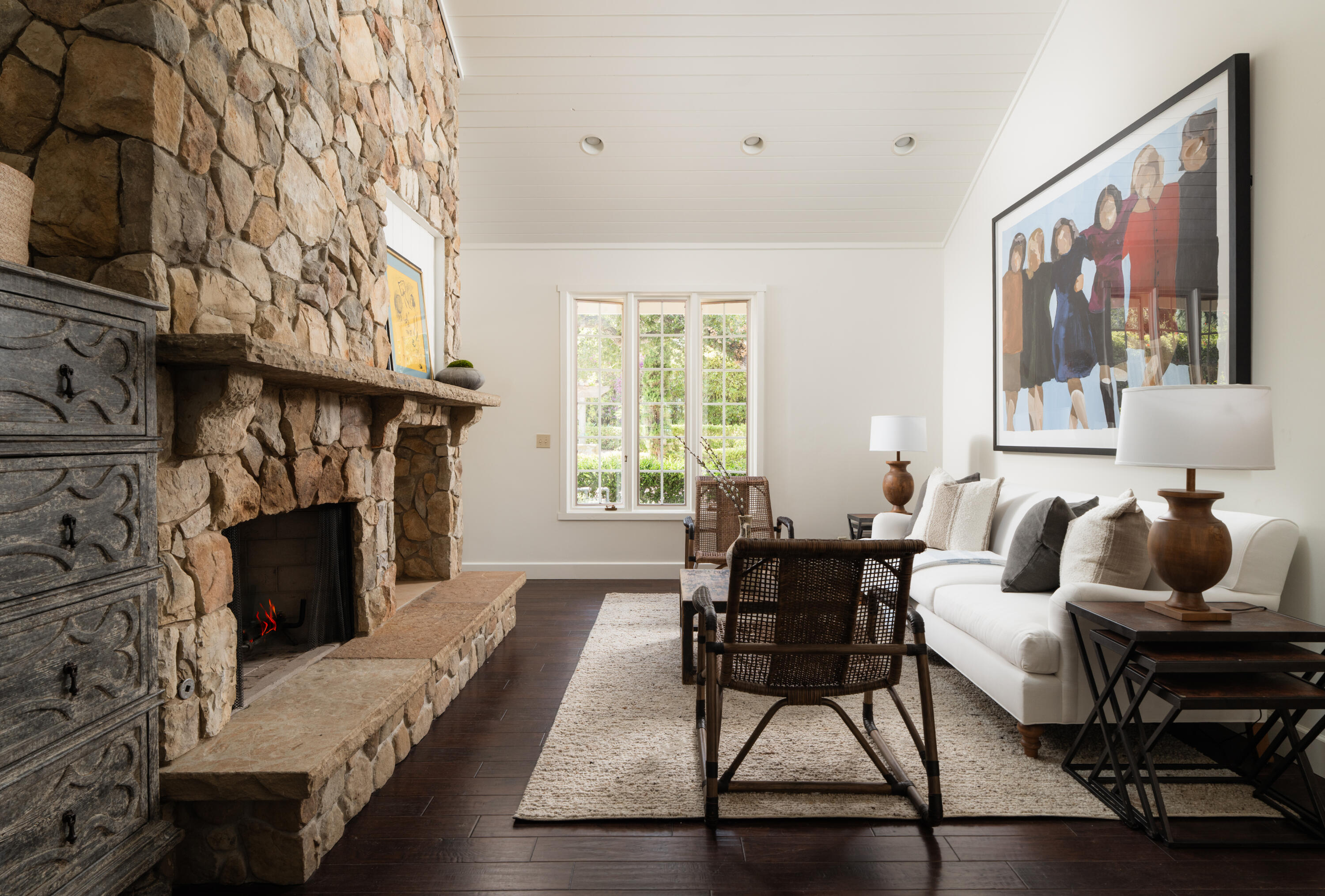 690 San Ysidro Road Montecito, CA 93108 - Photo 12 of 42 a living room with furniture a fireplace and a large window