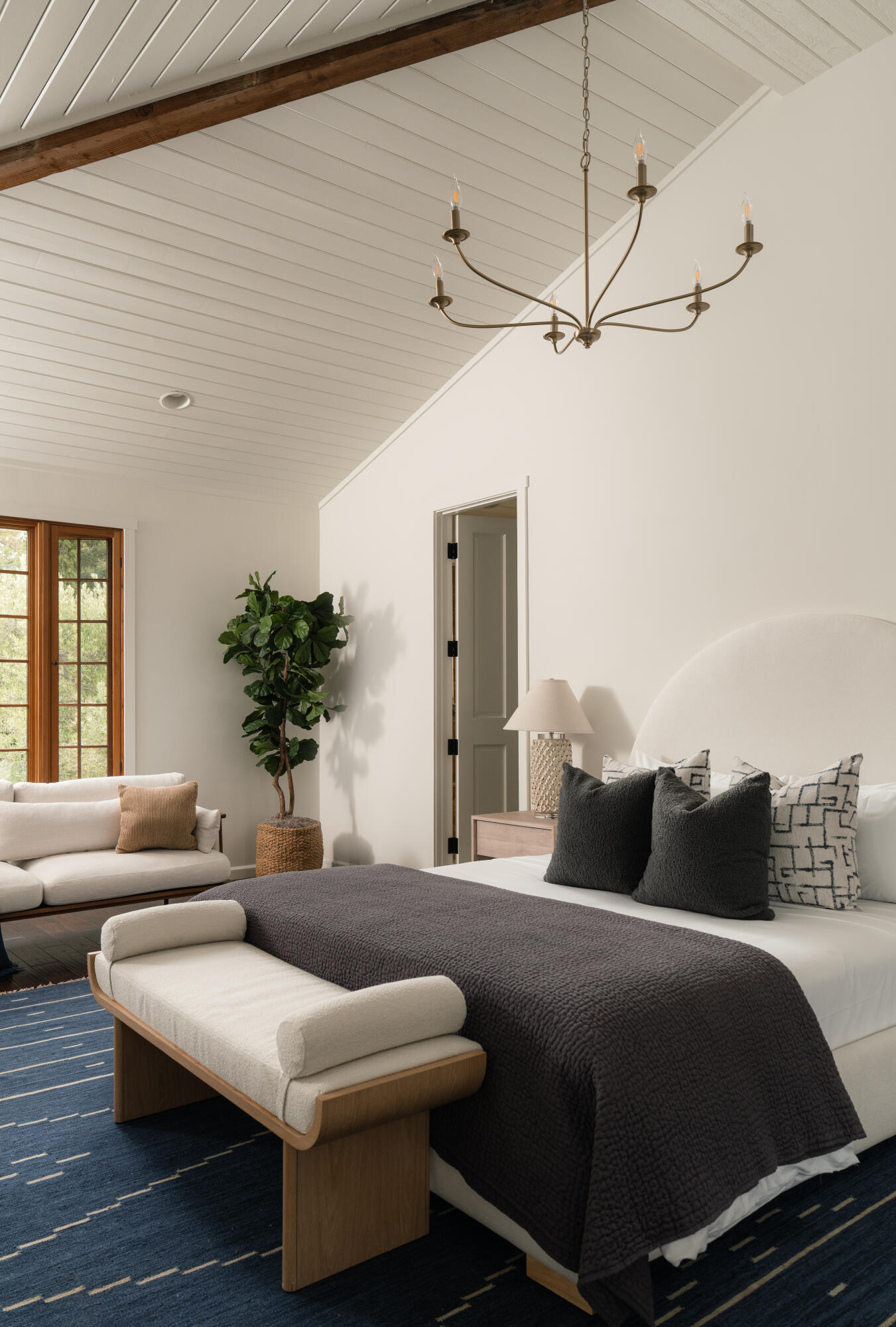 690 San Ysidro Road Montecito, CA 93108 - Photo 15 of 42 a bedroom with furniture and a potted plant