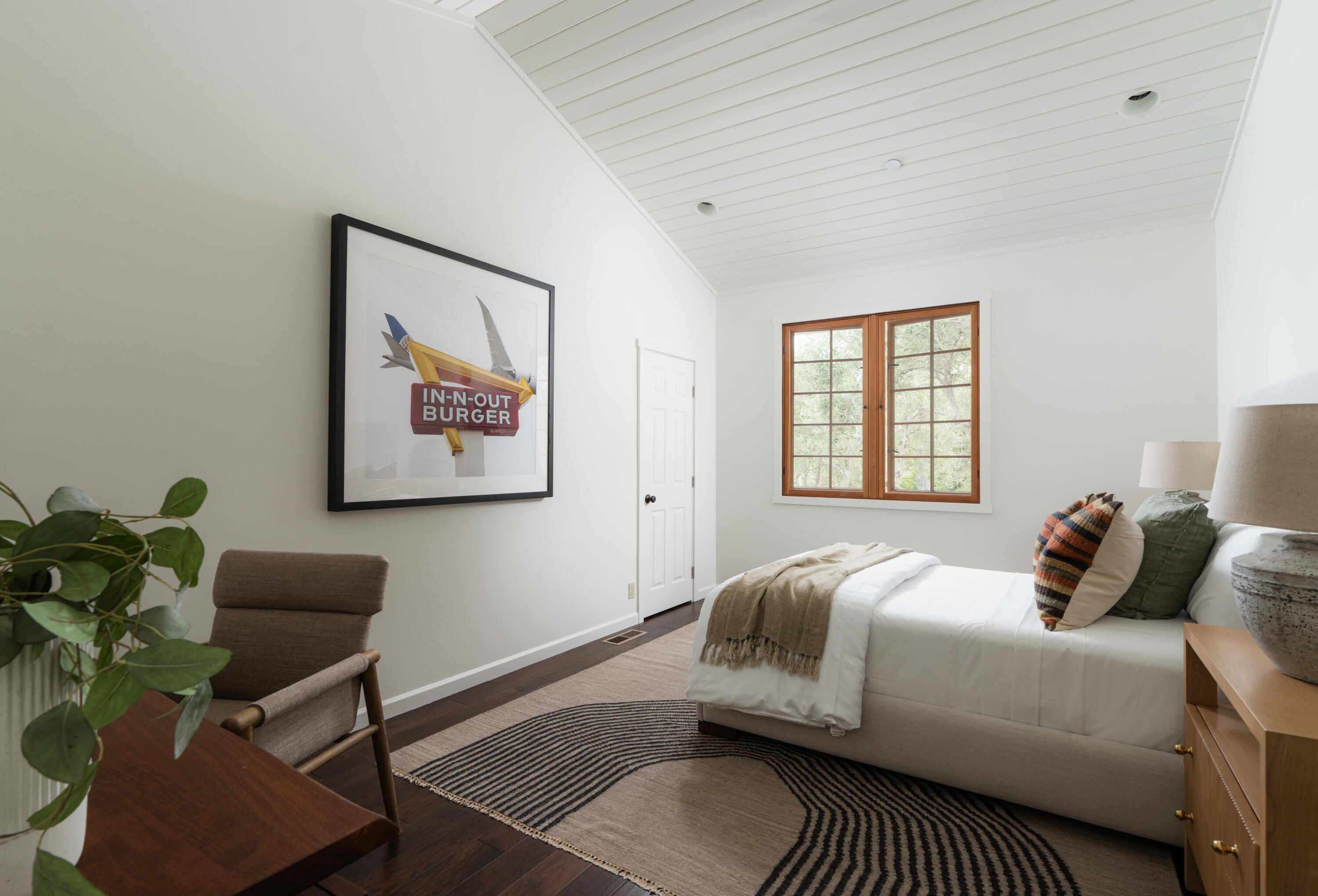 690 San Ysidro Road Montecito, CA 93108 - Photo 17 of 42 a bedroom with a bed and a couch