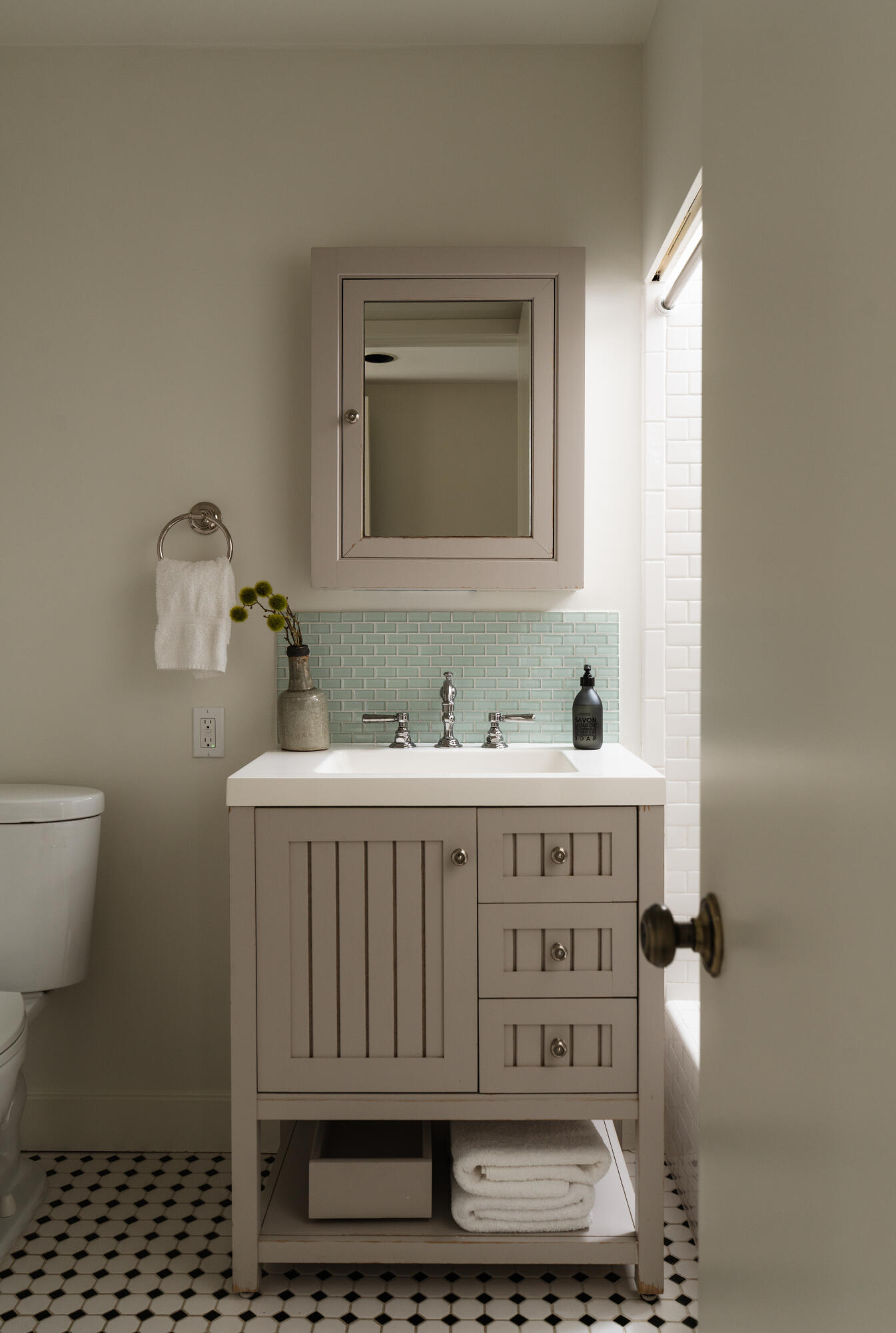 690 San Ysidro Road Montecito, CA 93108 - Photo 24 of 42 a bathroom with a sink a toilet and mirror