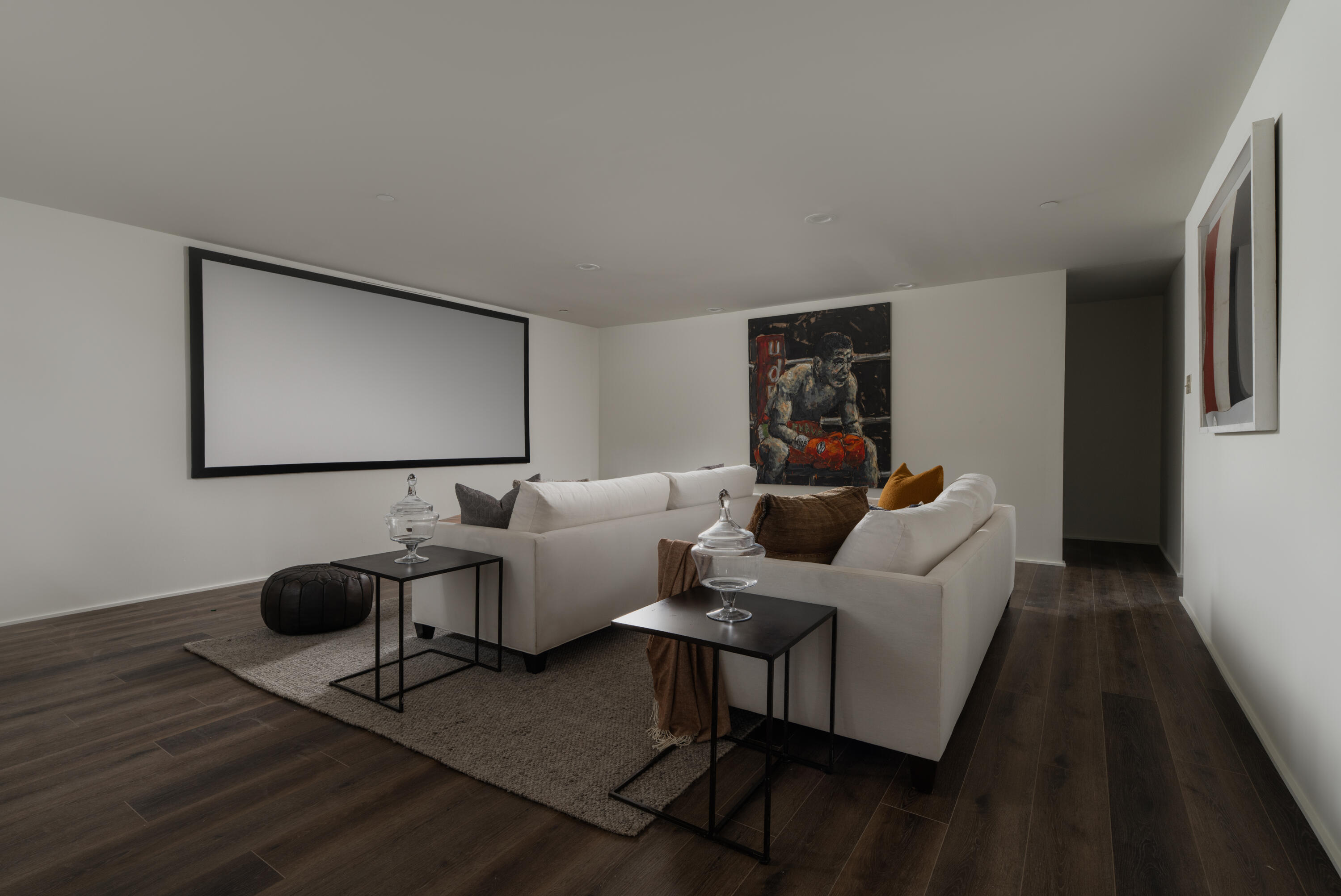 690 San Ysidro Road Montecito, CA 93108 - Photo 25 of 42 a living room with furniture and a flat screen tv