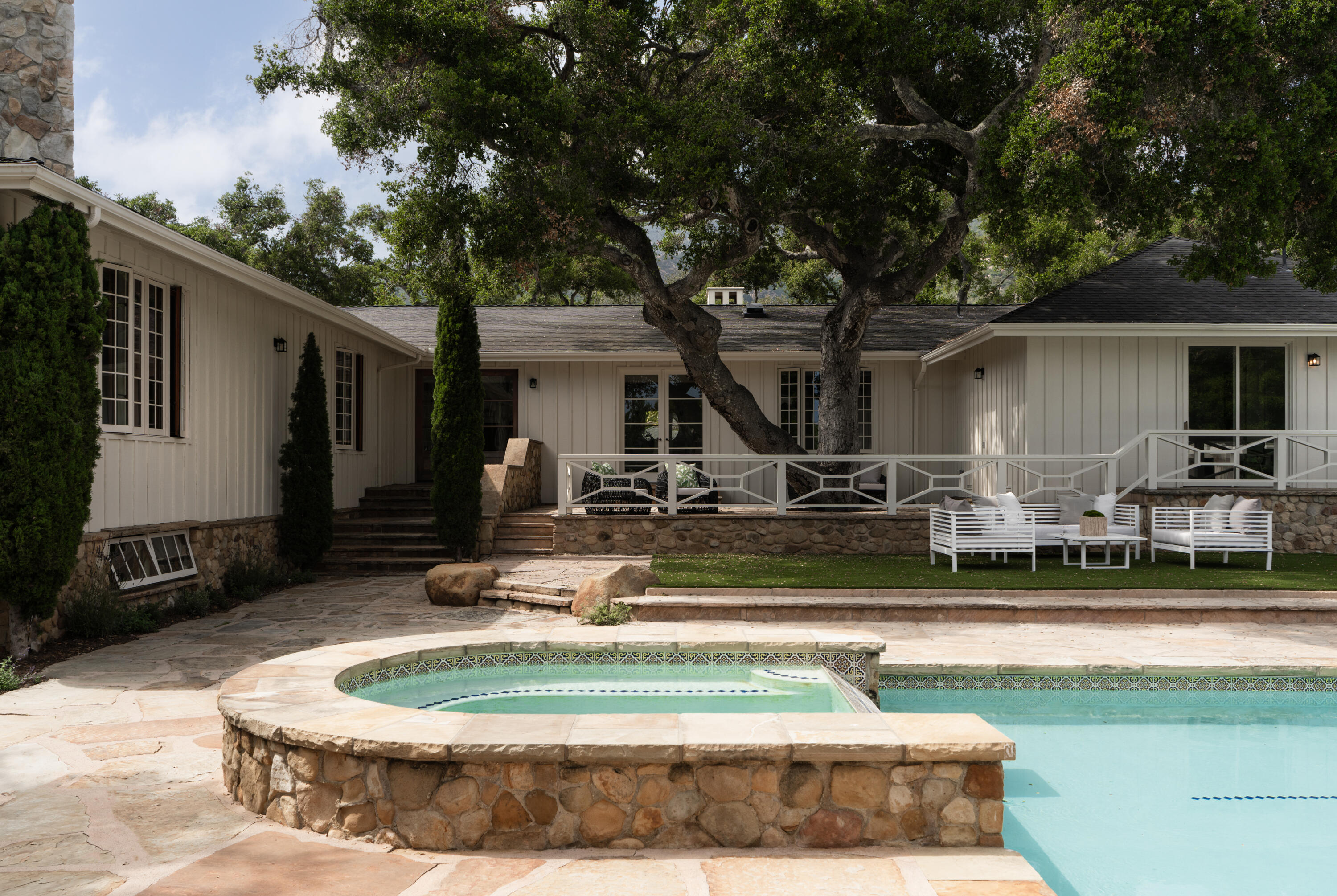 690 San Ysidro Road Montecito, CA 93108 - Photo 30 of 42 a view of a house with swimming pool and sitting area