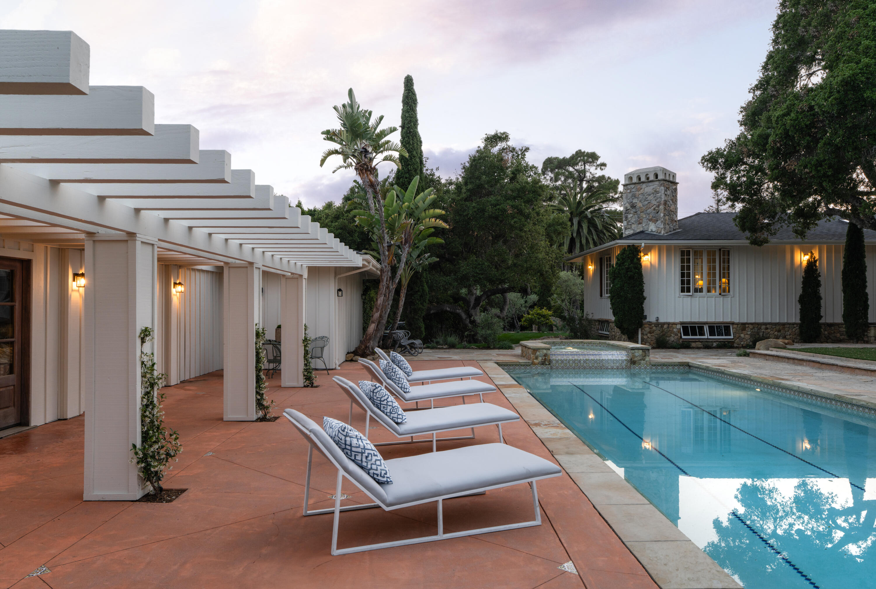 690 San Ysidro Road Montecito, CA 93108 - Photo 32 of 42 a view of a patio with a table and chairs