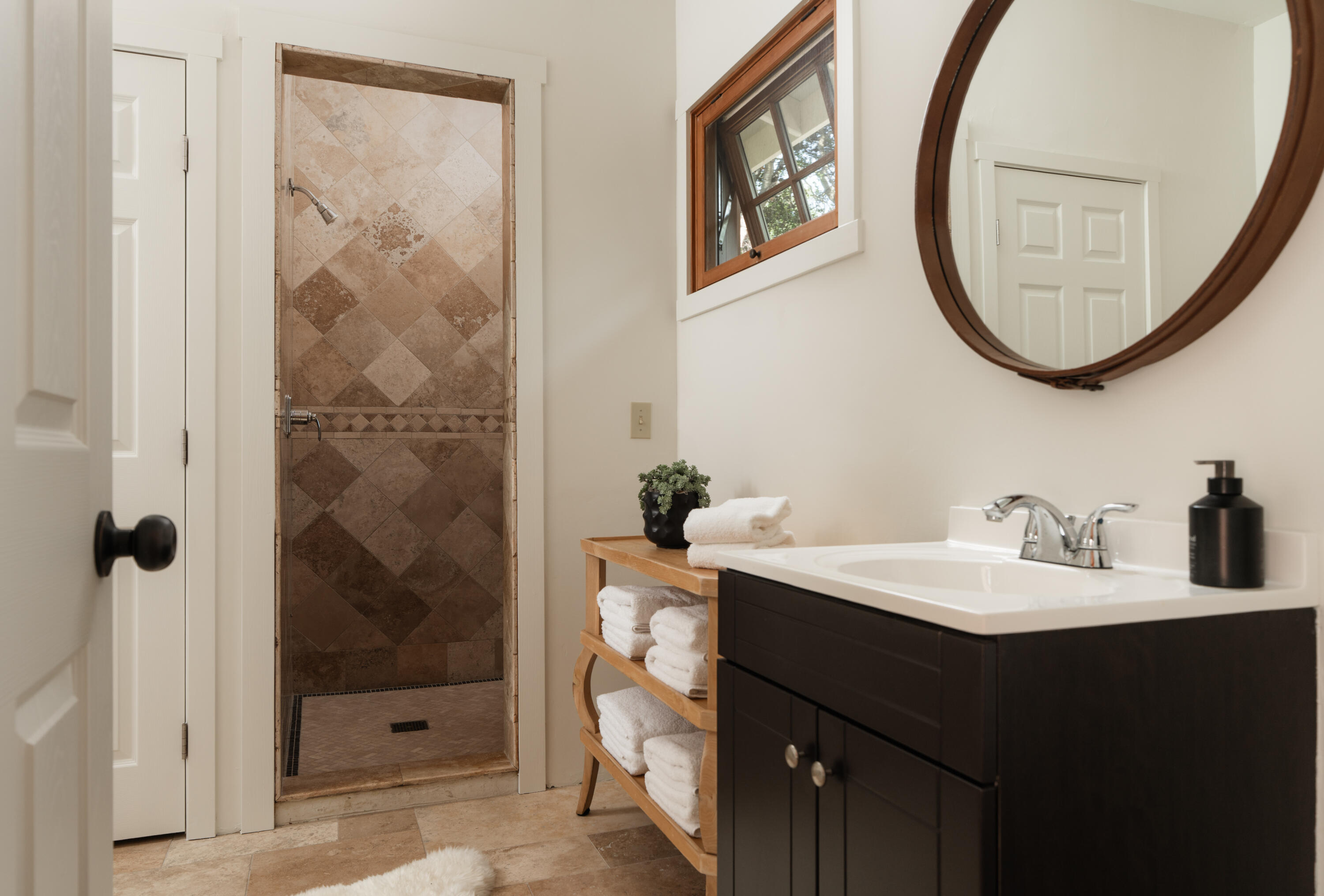 690 San Ysidro Road Montecito, CA 93108 - Photo 35 of 42 a bathroom with a sink and a mirror