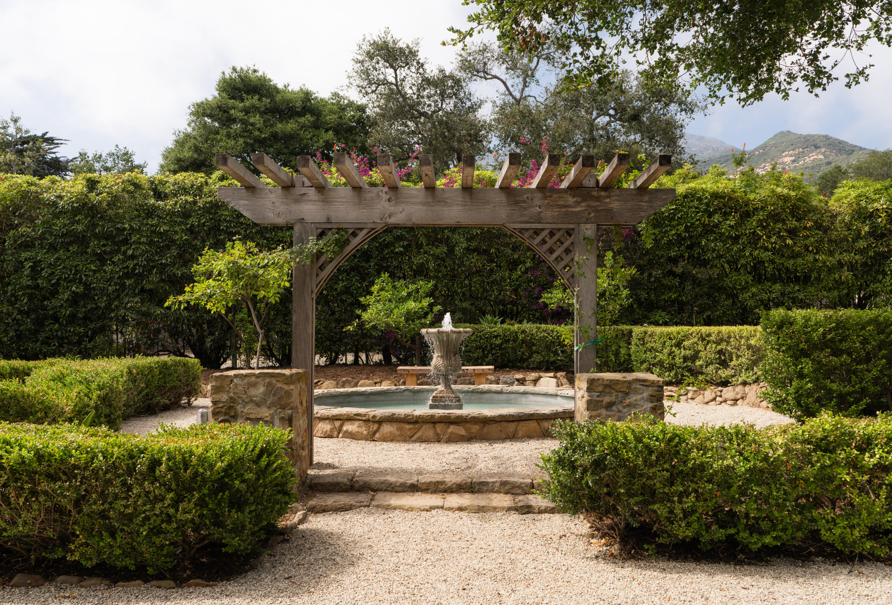 690 San Ysidro Road Montecito, CA 93108 - Photo 37 of 42 a view of a yard with plants and large trees