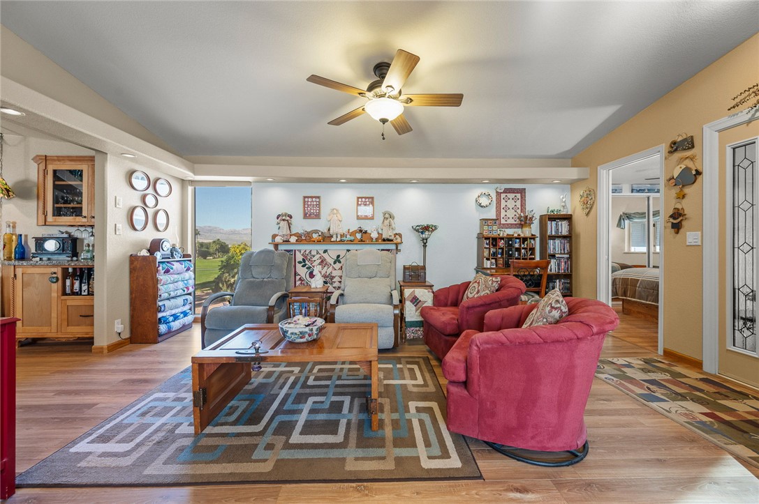 2000 Ramar Road, Unit 665 Bullhead City, AZ 86442 - Photo 14 of 83 Main living area with spacious layout, recessed lighting, ceiling fan, and ample natural light.