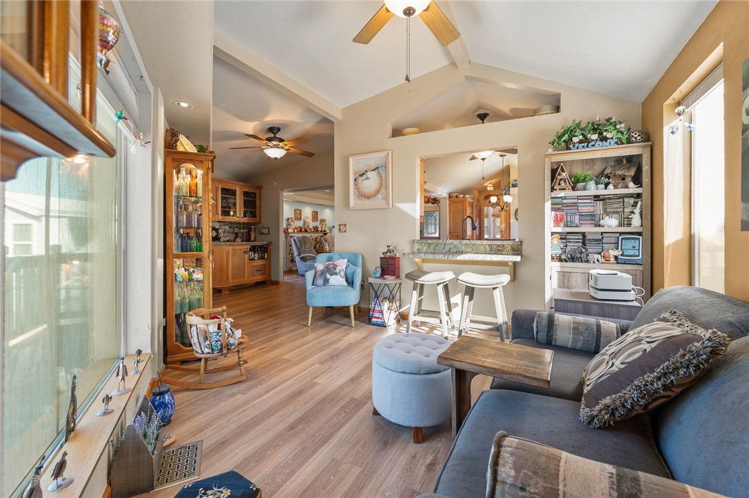 2000 Ramar Road, Unit 665 Bullhead City, AZ 86442 - Photo 40 of 83 Additional angle showing open-concept layout, luxury hard surface flooring, and access to both kitchen and living areas.