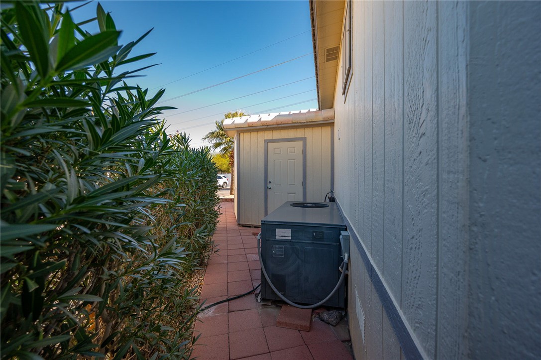 2000 Ramar Road, Unit 665 Bullhead City, AZ 86442 - Photo 53 of 83 Additional detached storage shed offering secure, weather-protected storage for tools, hobbies, or seasonal items.
