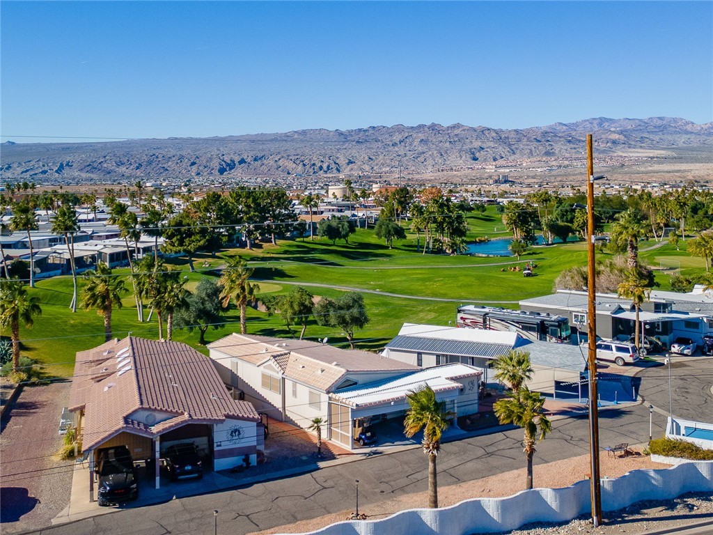 2000 Ramar Road, Unit 665 Bullhead City, AZ 86442 - Photo 55 of 83 Aerial view highlighting direct golf course frontage and the home?s position within Riverview RV Resort.