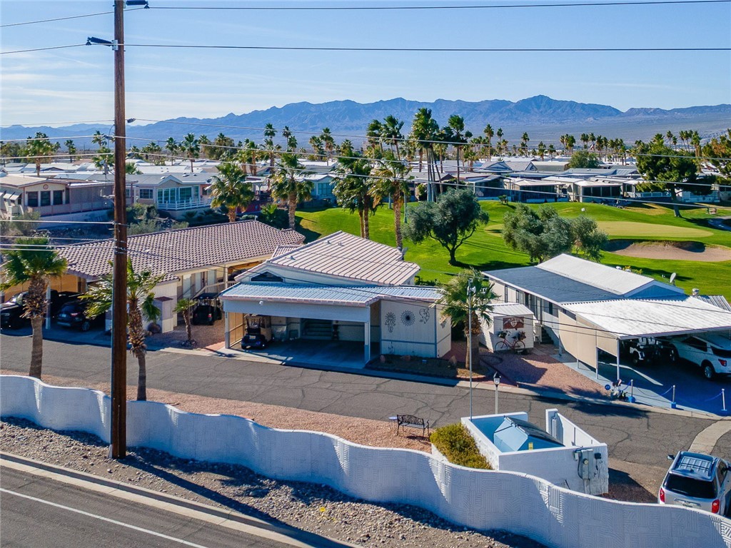 2000 Ramar Road, Unit 665 Bullhead City, AZ 86442 - Photo 57 of 83 Aerial angle emphasizing proximity to the green, open sightlines, and well-maintained course landscaping.