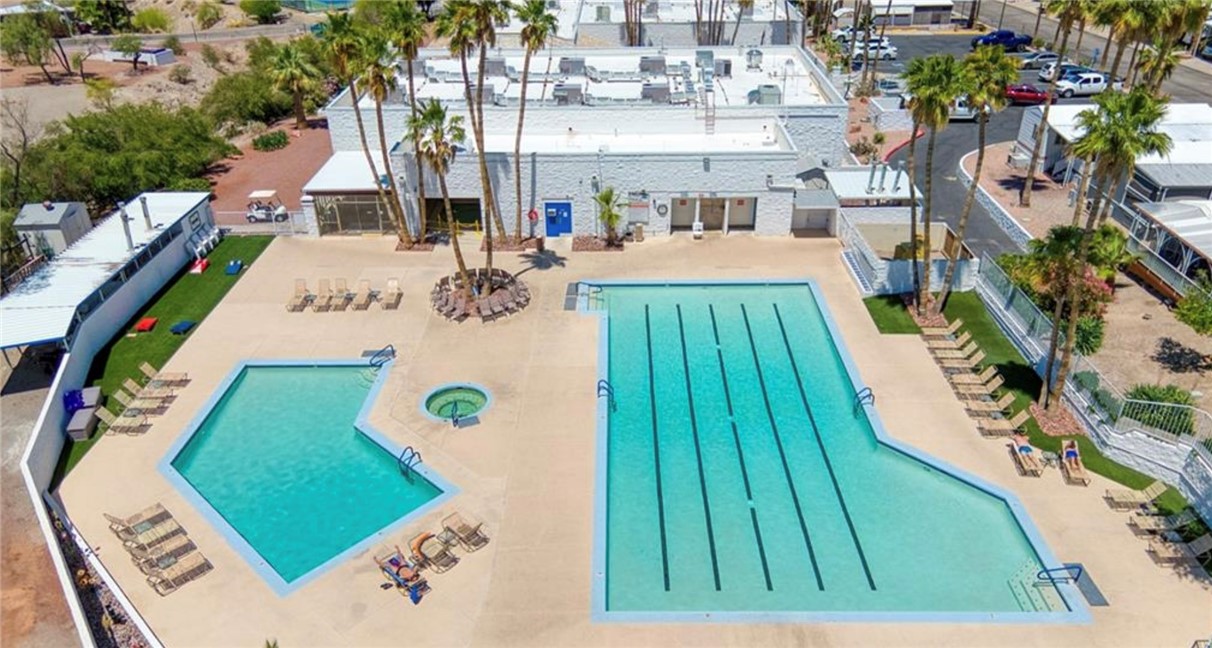 2000 Ramar Road, Unit 665 Bullhead City, AZ 86442 - Photo 66 of 83 Overhead view of the pool and spa area, showing generous seating, easy access, and well-maintained facilities.
