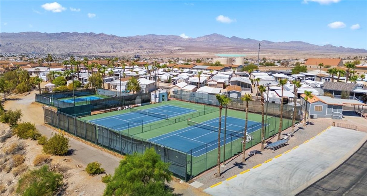 2000 Ramar Road, Unit 665 Bullhead City, AZ 86442 - Photo 68 of 83 Aerial view of community tennis and pickleball courts, offering multiple courts and convenient access for residents.