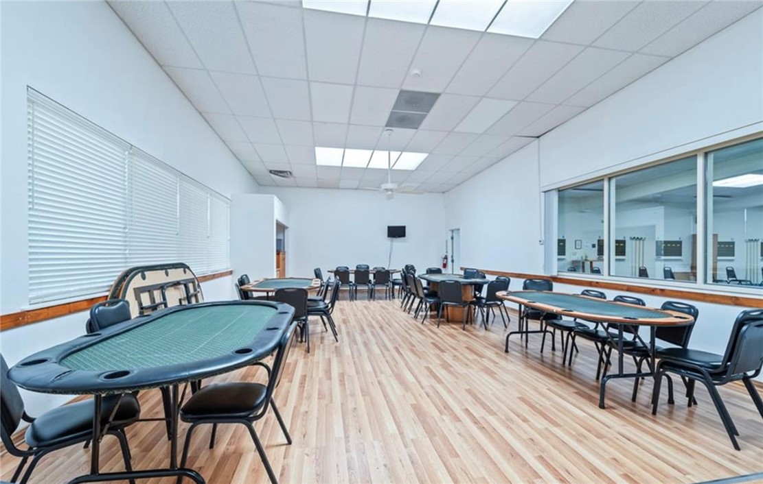 2000 Ramar Road, Unit 665 Bullhead City, AZ 86442 - Photo 83 of 83 Card and game room featuring poker tables, open floor plan, and casual seating areas.
