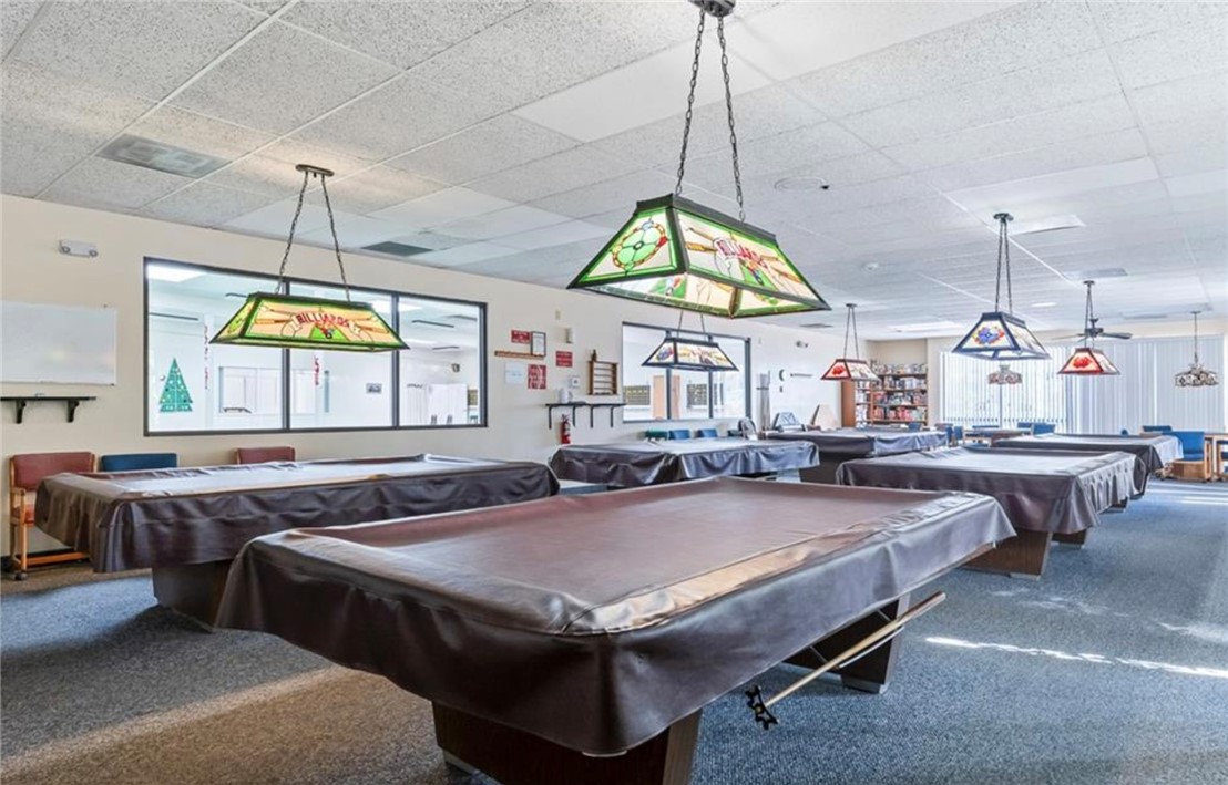 2000 Ramar Road, Unit 665 Bullhead City, AZ 86442 - Photo 75 of 83 Billiards room with multiple pool tables, overhead lighting, and space for group recreation.