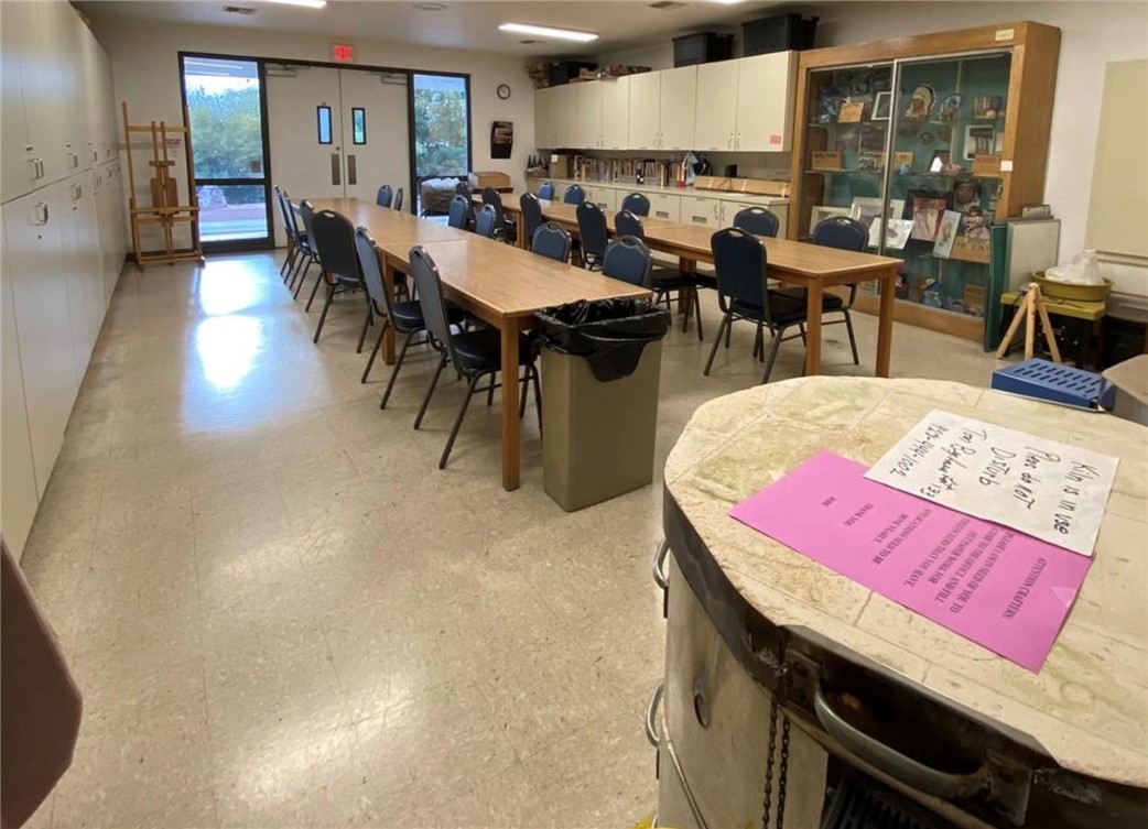 2000 Ramar Road, Unit 665 Bullhead City, AZ 86442 - Photo 77 of 83 Community activity room offering large worktables, storage cabinetry, and space for classes, crafts, or group activities.