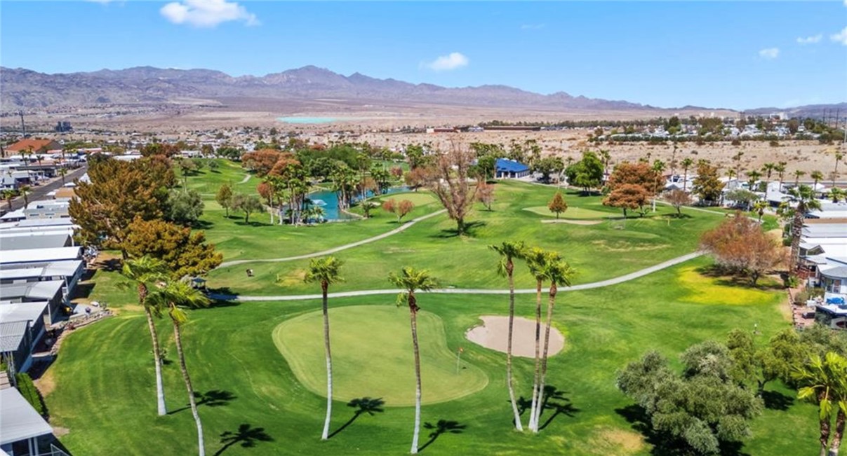 2000 Ramar Road, Unit 665 Bullhead City, AZ 86442 - Photo 80 of 83 Wide aerial highlighting multiple holes, cart paths, and lush greenbelts throughout the community.