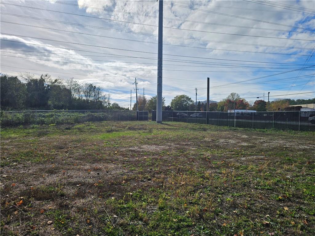 1310 Bells Ferry Road Marietta, GA 30066 - Photo 5 of 9 a backyard of a house with lots of green space