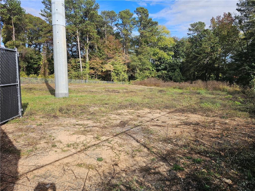 1310 Bells Ferry Road Marietta, GA 30066 - Photo 6 of 9 a view of a yard with an tree