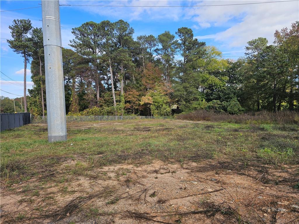 1310 Bells Ferry Road Marietta, GA 30066 - Photo 7 of 9 a view of a yard with a tree