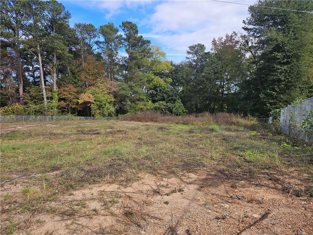 1310 Bells Ferry Road Marietta, GA 30066 - Photo 8 of 9 a view of a yard with a tree