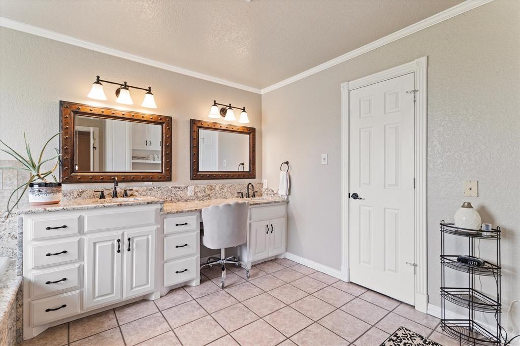 20175 Willow Glade Circle Pilot Point, TX 76258 - Photo 13 of 32 Bathroom with tile patterned floors, crown molding, vanity, and a textured ceiling