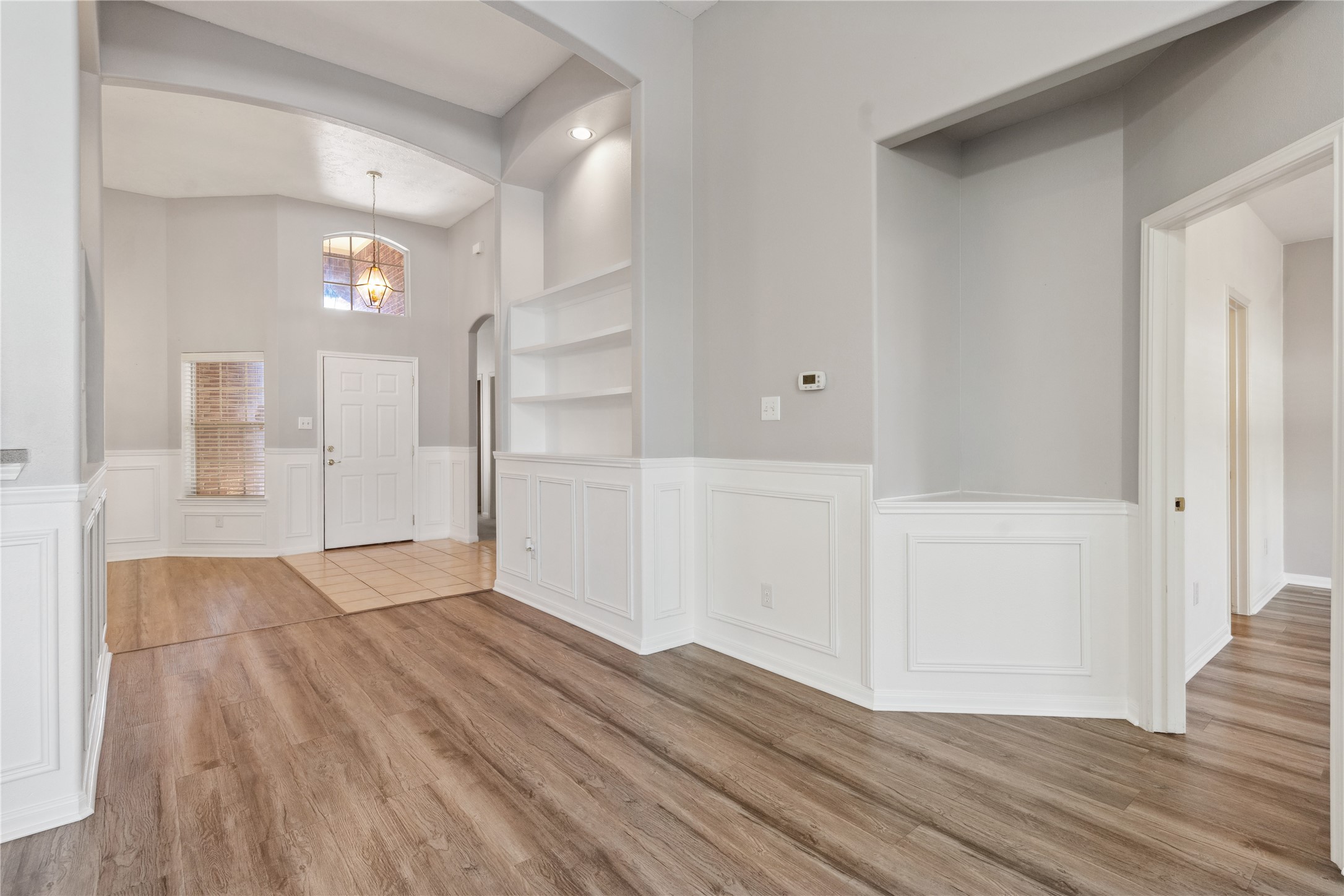 7906 Fortrose Court Houston, TX 77070 - Photo 17 of 28 a view of empty room with wooden floor