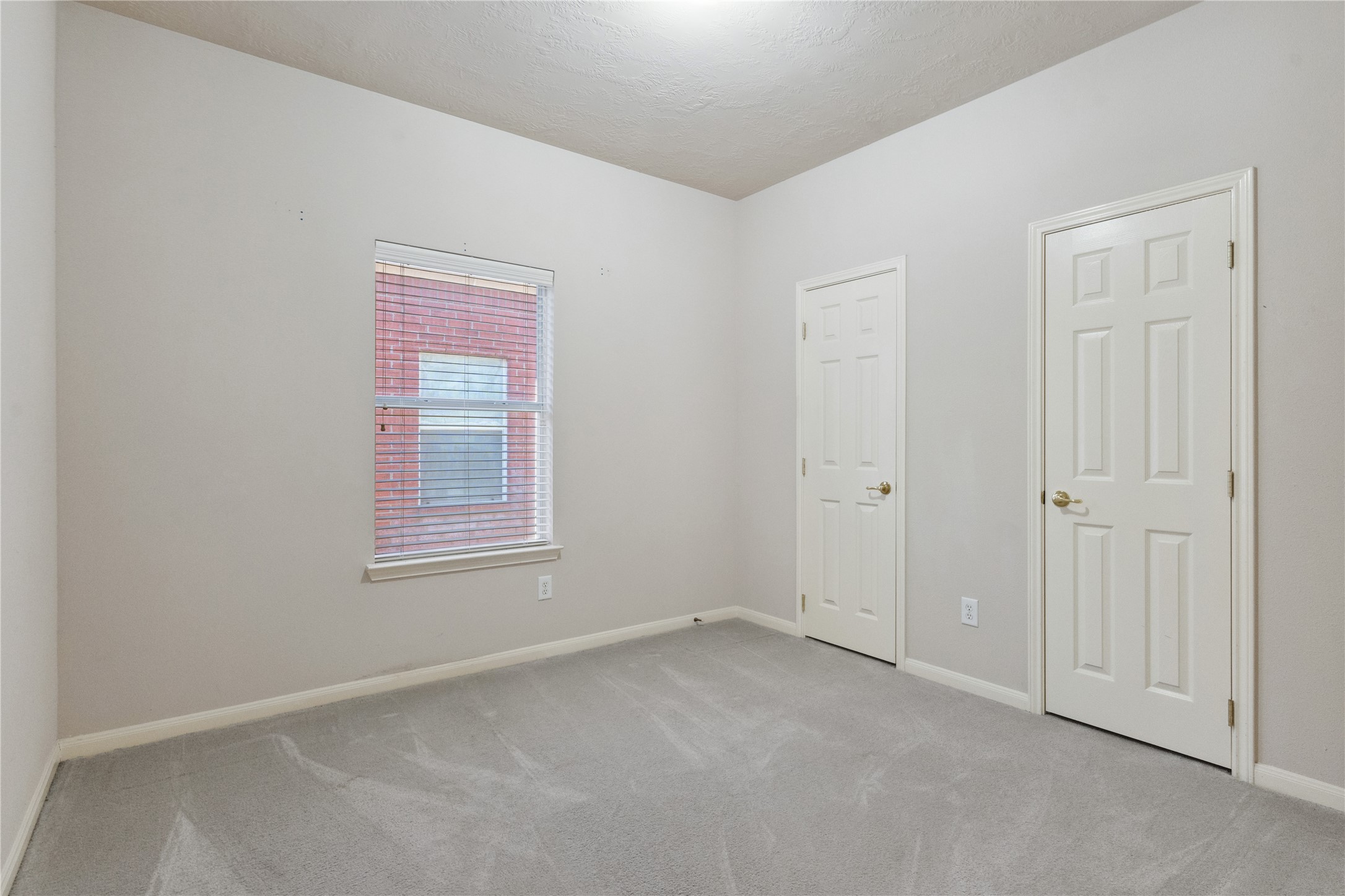 7906 Fortrose Court Houston, TX 77070 - Photo 25 of 28 an empty room with windows