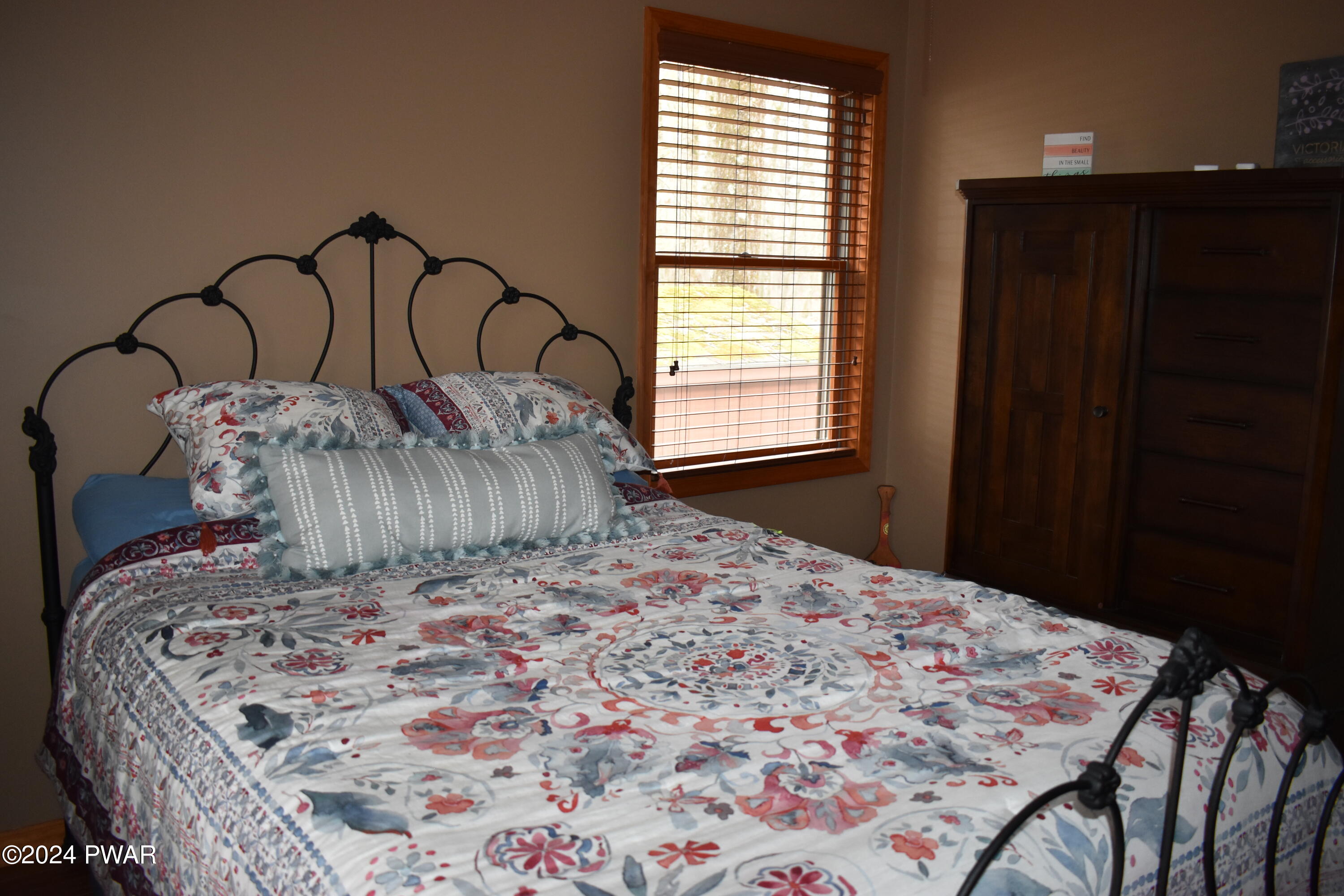 800 Rimrock Court Hawley, PA 18428 - Photo 14 of 30 a bedroom with a bed and a dresser