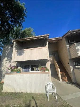 a view of outdoor space and deck in the back yard