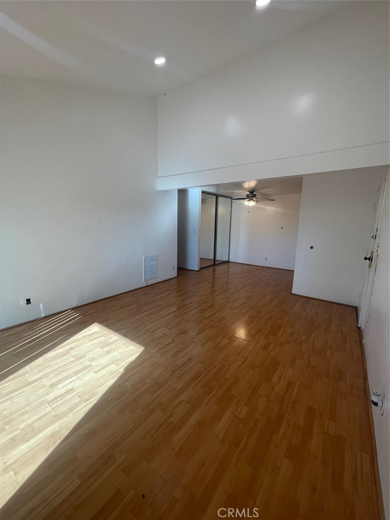 5800 Kanan Road, Unit 247 Agoura Hills, CA 91301 - Photo 3 of 16 a view of empty room with wooden floor and fan