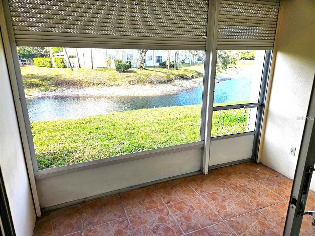 946 Virginia Street, Unit 104 Dunedin, FL 34698 - Photo 15 of 64 a view of an empty room and a window