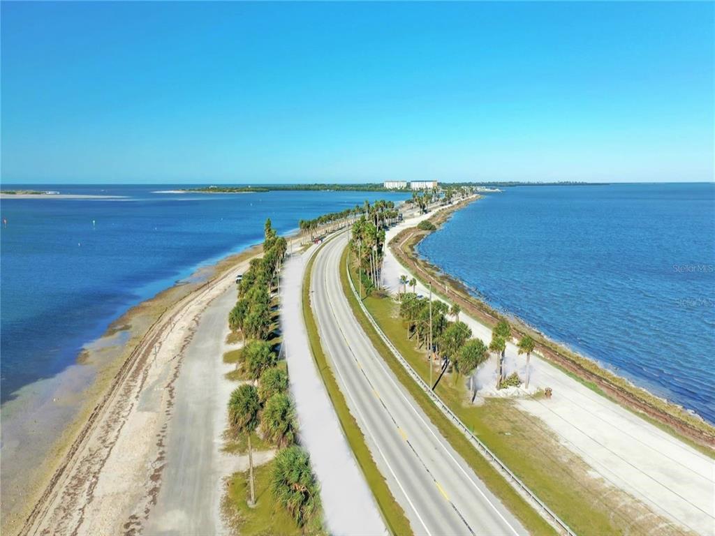 946 Virginia Street, Unit 104 Dunedin, FL 34698 - Photo 52 of 64 a view of balcony with ocean view