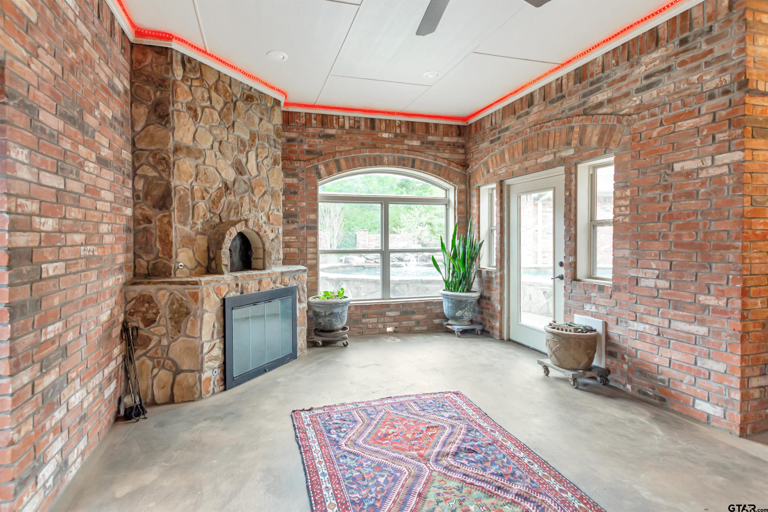 8350 Farm To Market 346 Flint, TX 75762 - Photo 17 of 47 a living room with furniture and a fireplace