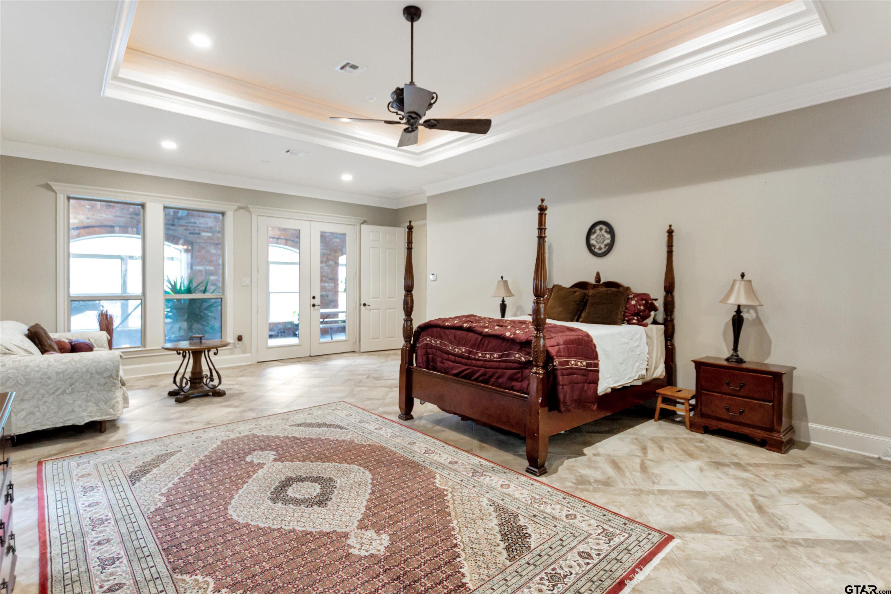 8350 Farm To Market 346 Flint, TX 75762 - Photo 31 of 47 a bedroom with a large bed and furniture