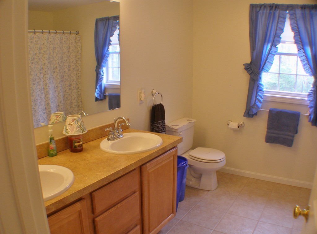12 Tannery Road Sturbridge, MA 01518 - Photo 20 of 26 a bathroom with a sink and a toilet