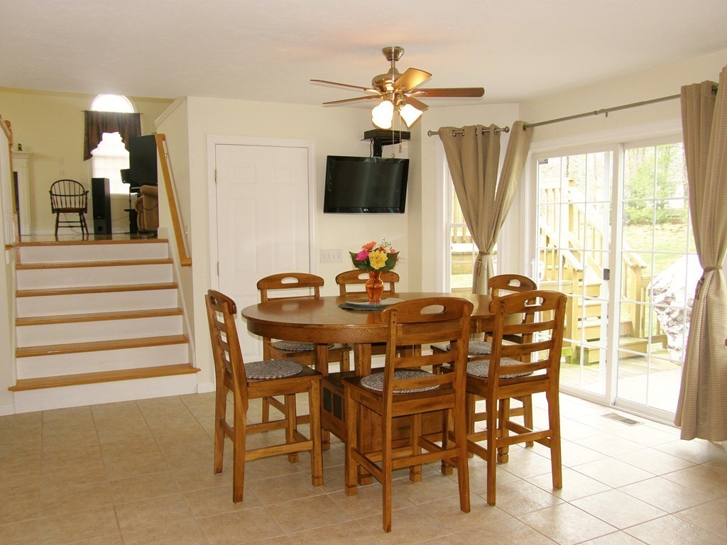 12 Tannery Road Sturbridge, MA 01518 - Photo 8 of 26 a view of a dining room with furniture and chandelier