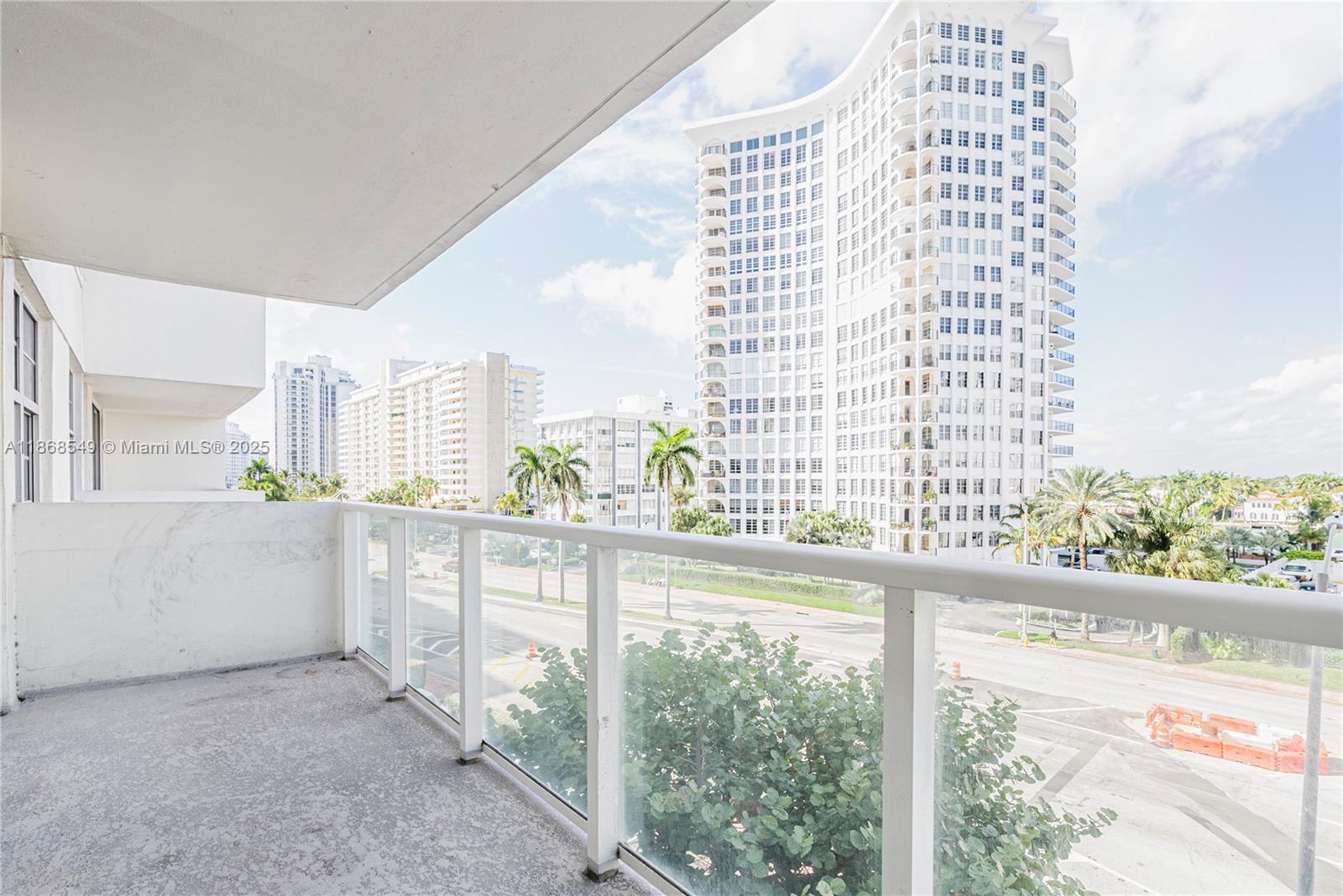 5701 Collins Avenue, Unit 405 Miami Beach, FL 33140 - Photo 13 of 18 a view of a city from a balcony