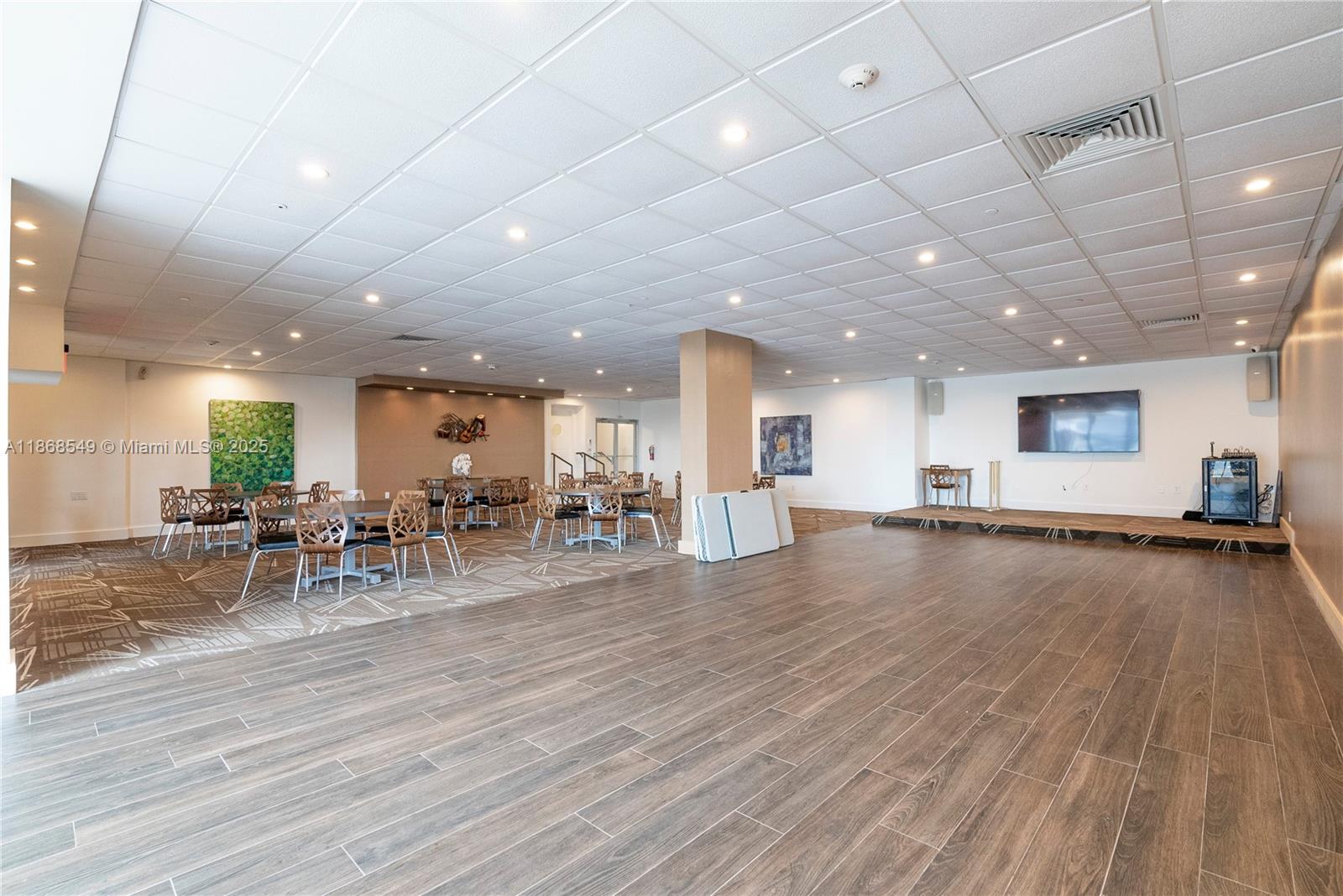 5701 Collins Avenue, Unit 405 Miami Beach, FL 33140 - Photo 15 of 18 a view of a big room with chairs
