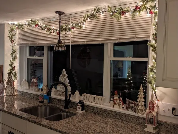 a kitchen with a sink and refrigerator