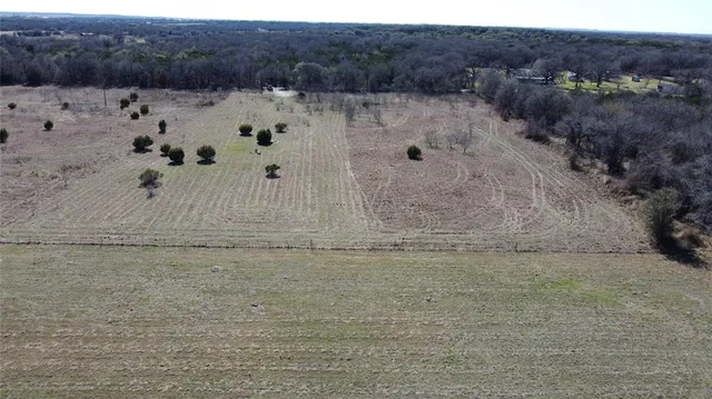 a view of a backyard of a house