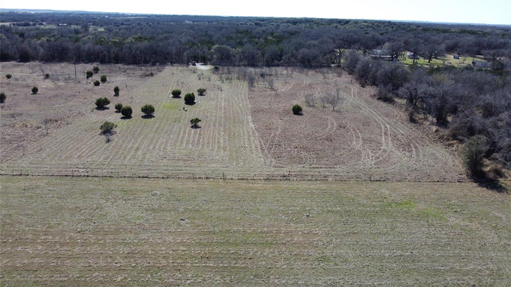 214 Private Road 2950 Kopperl, TX 76652 - Photo 6 of 9 a view of a dry yard with mountain