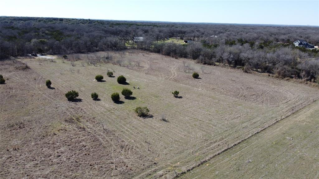 214 Private Road 2950 Kopperl, TX 76652 - Photo 8 of 9 a view of a backyard of a house