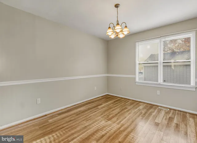 a view of a room with a large window