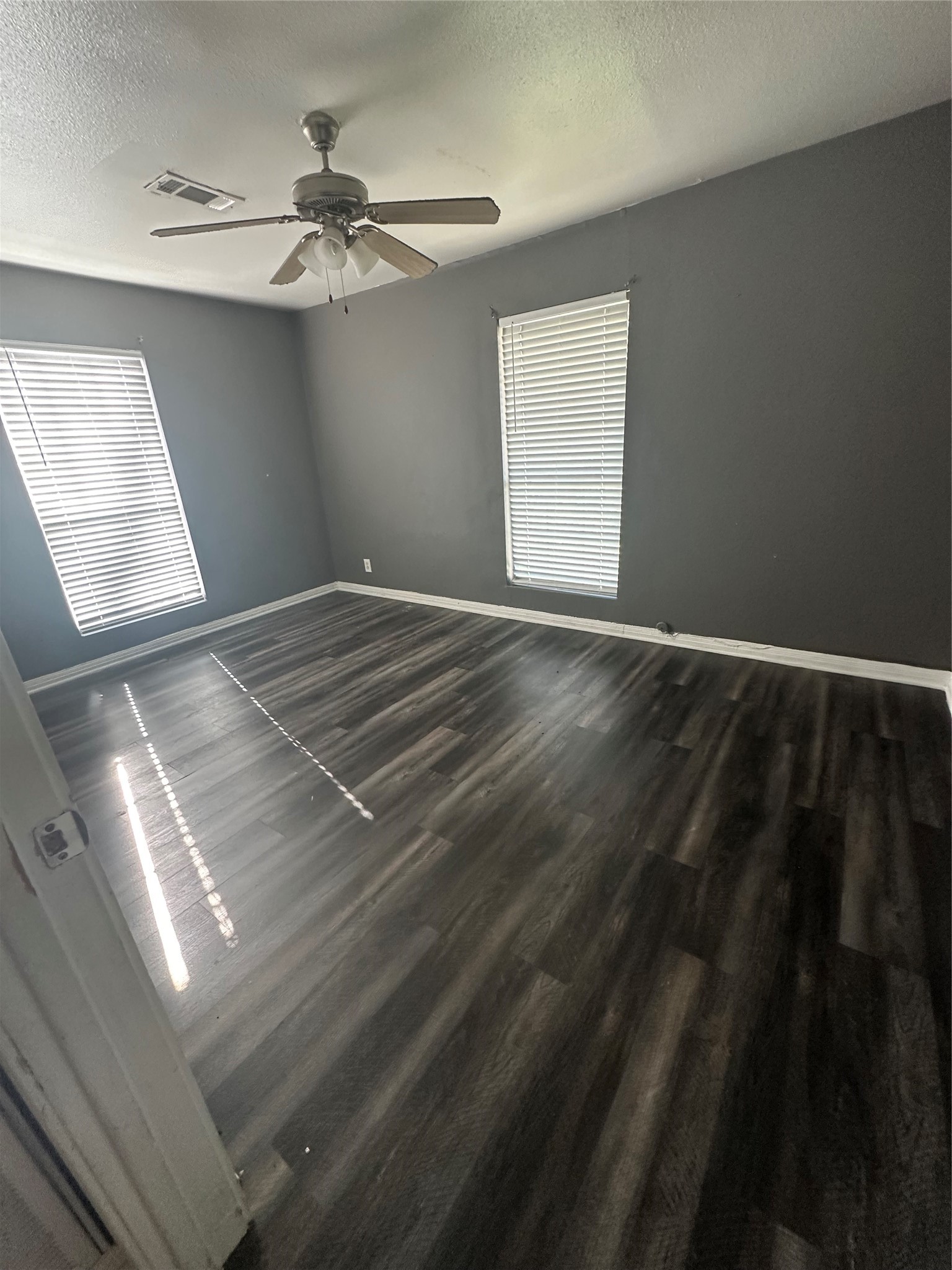 8214 Barkley Street Houston, TX 77017 - Photo 6 of 9 Bedroom 2 with updated flooring and ample natural light