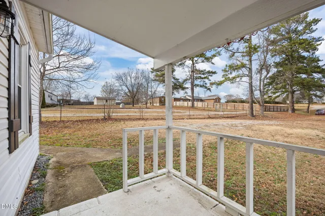a view of a bathroom from a hallway