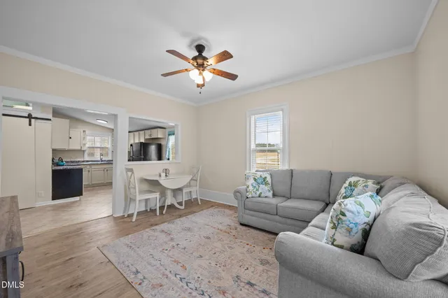 a living room with furniture and a couch